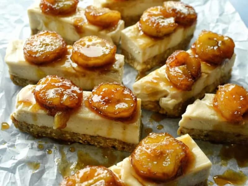 Raw coconut cheesecake bars with rum flambe bananas — Vanlife Eats